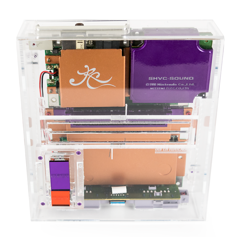 Illustration for article titled The Salvaged Guts Of Old SNES Consoles Look Great Inside These New Cases